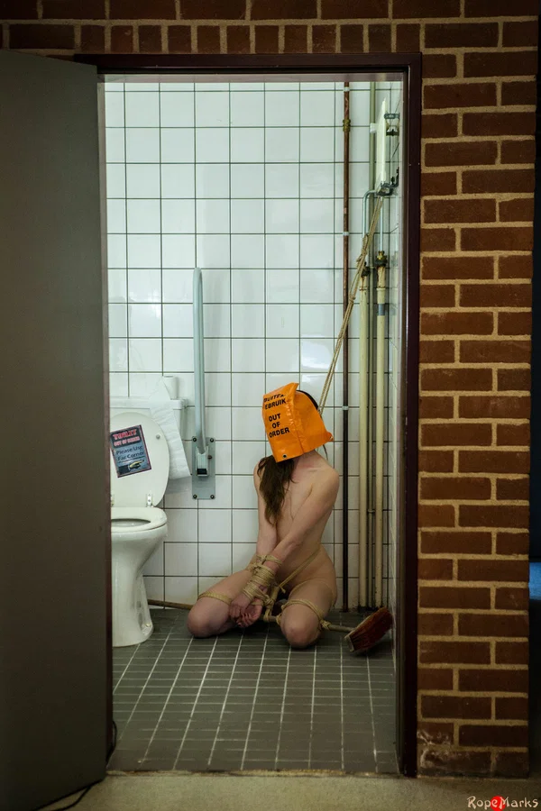 Caucasian female is tied up in a bathroom with a bag on her head  - BDSM, Bondage, High Heels, Stockings, Legs  - Photo 9