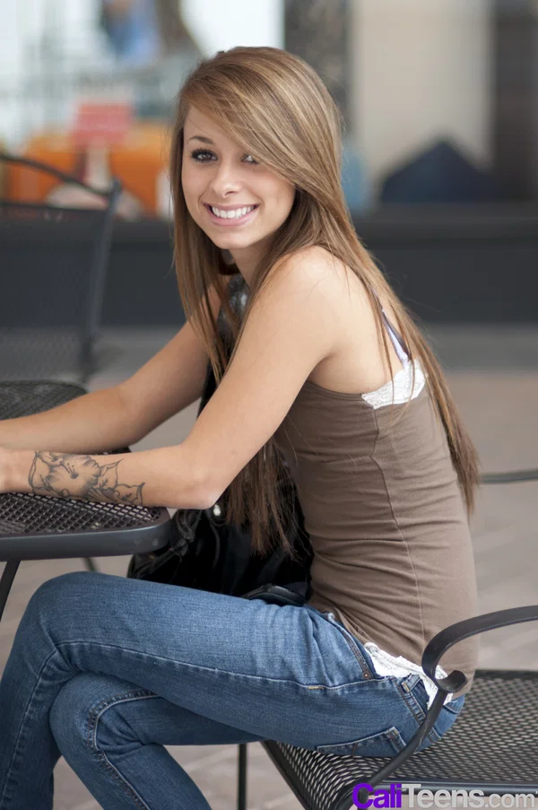 Sweet teen Rilee Jensen exposes her small tits in a public square  - Teen, Outdoor, Clothed, Jeans, Babe, Nipples, Tattoo, Tiny Tits, Beautiful, Solo  - Photo 2