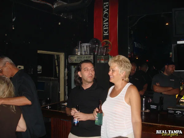 Amateur swingers show off her big breasts at a wild party at the bar  - Granny, Swingers, Mature, Amateur  - Photo 7