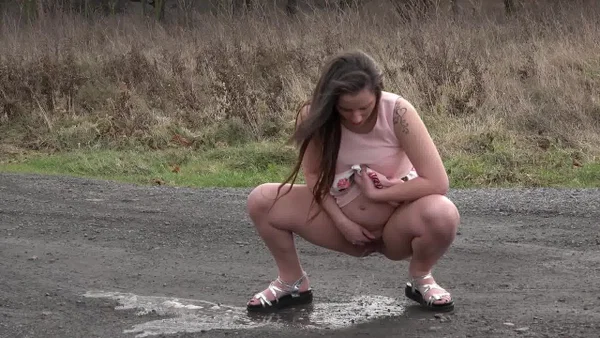 Caucasian girl Nicolette Noir takes a big piss on a dirt road in the country  - Pregnant, Pissing, Teen, Spreading, Outdoor, Czech, Non Nude, Close Up, Skirt, Tattoo  - Photo 13