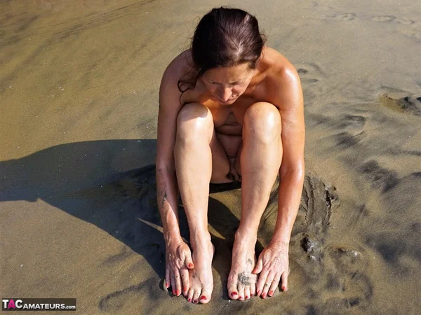 Naked older woman Diana Ananta covers her feet in beach sand at low tide  - Beach, Cougar, Mature, Amateur, Outdoor, Saggy Tits, Feet, Spreading, Pussy, Brunette  - Photo 11