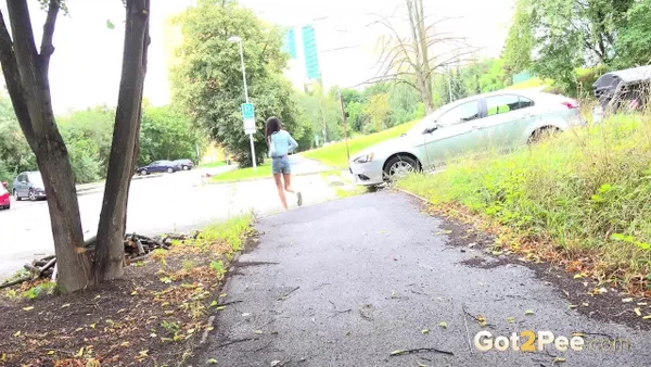 Skinny girl Mistica gets caught taking a piss on a paved path  - Public, Pissing, Pussy, Hairy, Spreading, Skinny, Outdoor, Close Up, Shorts, Tattoo  - Photo 15