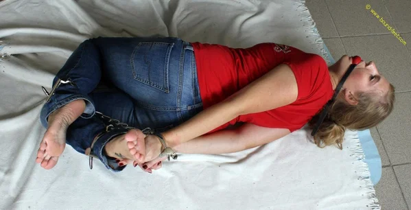 Blonde chick Albina Rose is hog tied and gagged in a T-shirt and jeans  - Jeans, Feet, Bondage, BDSM, Blonde, Clothed, Non Nude, Tattoo, Pigtails  - Photo 9
