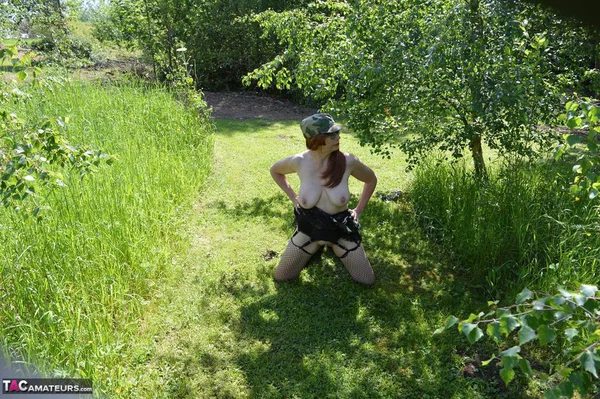 Busty amateur Barby Slut exposes her pussy during a walk in nature  - Boots, MILF, Amateur, Upskirt, Outdoor, Stockings, Skirt, Spreading, Ass, Babe  - Photo 16
