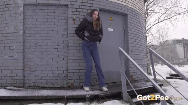 White girl pulls down her jeans to pee in the snow behind a building  - Pissing, Jeans, Outdoor, Pussy, Spreading, Solo, Close Up, Shaved, Panties, Babe  - Photo 3