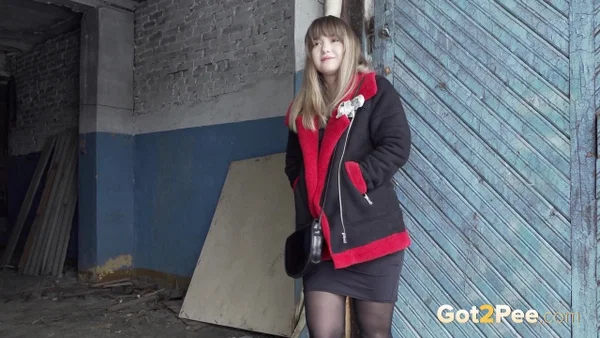 Blonde girl Veronica takes a pee in nylons up against a wooden door  - Pissing, Public, Pantyhose, Outdoor, Close Up, Pussy, Panties, Shaved, Skirt, Blonde  - Photo 2