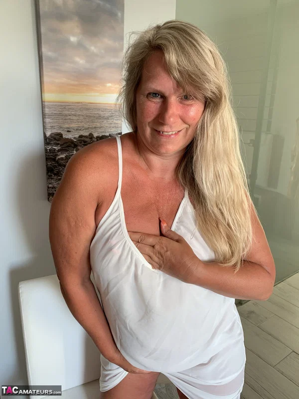 Thick older woman Sweet Susi exposes tan lined tits after hiking up her dress  - BBW, Mature, Chubby, Thick, Saggy Tits, MILF, Curvy, Amateur, Clothed, Spreading  - Photo 5