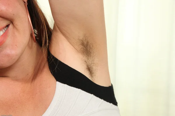 Amateur girl Olivia Rose shows her hairy pussy and legs while getting naked  - Photo 7