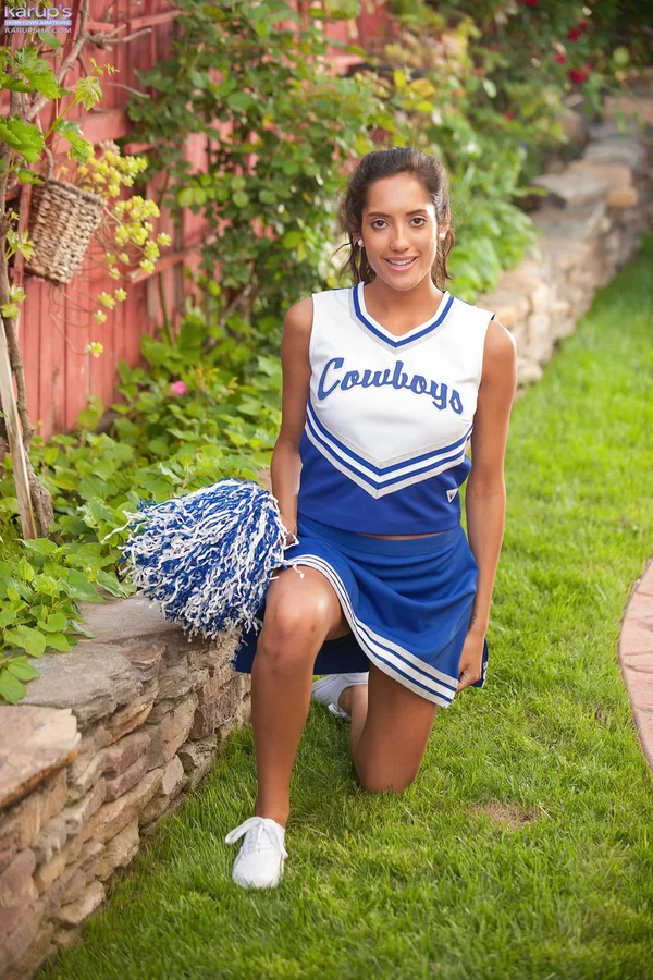 Brunette cheerleader Chloe Amour bares her hot body & fingers her ass outdoors  - Cheerleader, Outdoor, Latina, Natural Tits, Uniform, Amateur, Skirt, Upskirt, Anal, Ass  - Photo 1