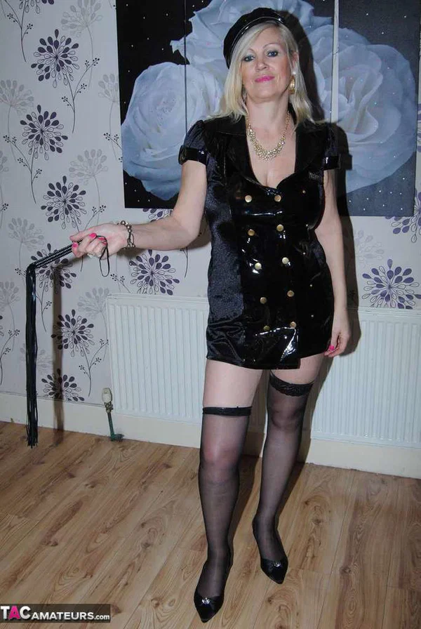 Mature blonde woman Dimonty frees her tits and twat from a short latex dress  - Mature, Saggy Tits, Latex, Stockings, Blonde, Amateur, Clothed, European, Lingerie, Panties  - Photo 14