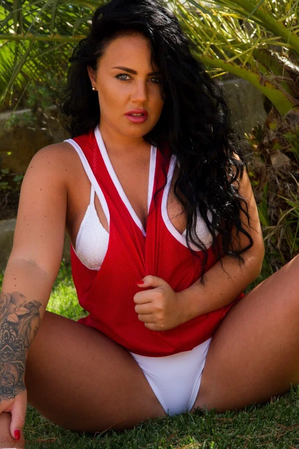 Brunette amateur Olivia Paige removes a red dress to model a white bikini  - Bikini, Upskirt, Outdoor, Clothed, Tattoo, Natural Tits, Big Tits, Skirt, Spreading, Babe  - Photo 6