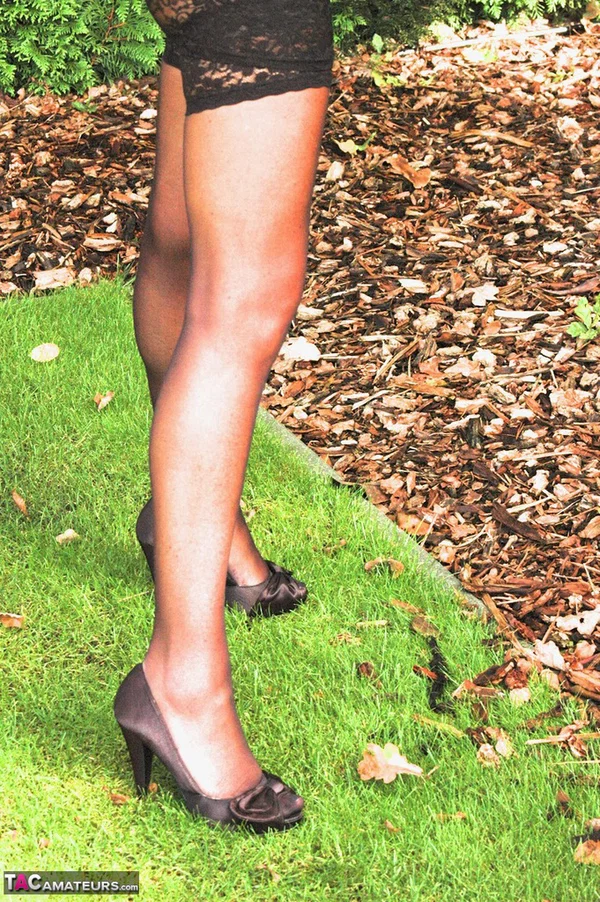 Redhead amateur Kyras Nylons tends to her garden in sheer attire and nylons  - Outdoor, Amateur, MILF, Lingerie, Stockings, Babe, High Heels, Beautiful, European, Ass  - Photo 3