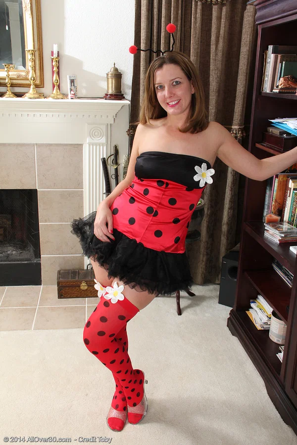 30 plus female frees her small tits and bald pussy from a cosplay outfit  - MILF, Clothed, Stockings, Spreading, Ass, Nipples, Shaved, Skirt, Tiny Tits, Undressing  - Photo 2