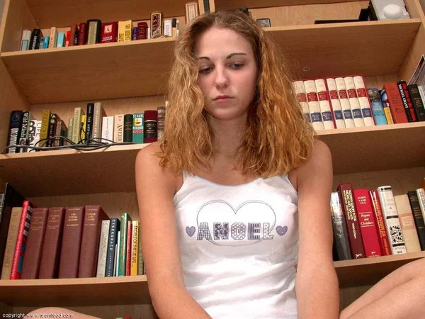 Young solo girl removes cute panties and bra to go naked in front of bookcase  - Teen, Socks, Amateur, Babe, Panties, Lingerie, Ass, Undressing, Close Up, Pussy  - Photo 4