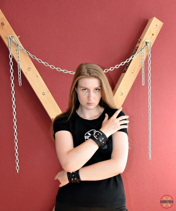 Experimental Yuly dons gags before being attached to a St Andrew's Cross  - BDSM, Bondage, Clothed, Non Nude  - Photo 1