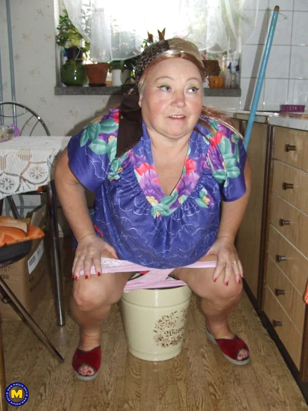 Fat granny Regina strips her clothes and poses while cleaning the kitchen  - Granny, Fetish, Mature, BBW, Chubby, Curvy, Thick, Pissing, Amateur, Big Tits  - Photo 3