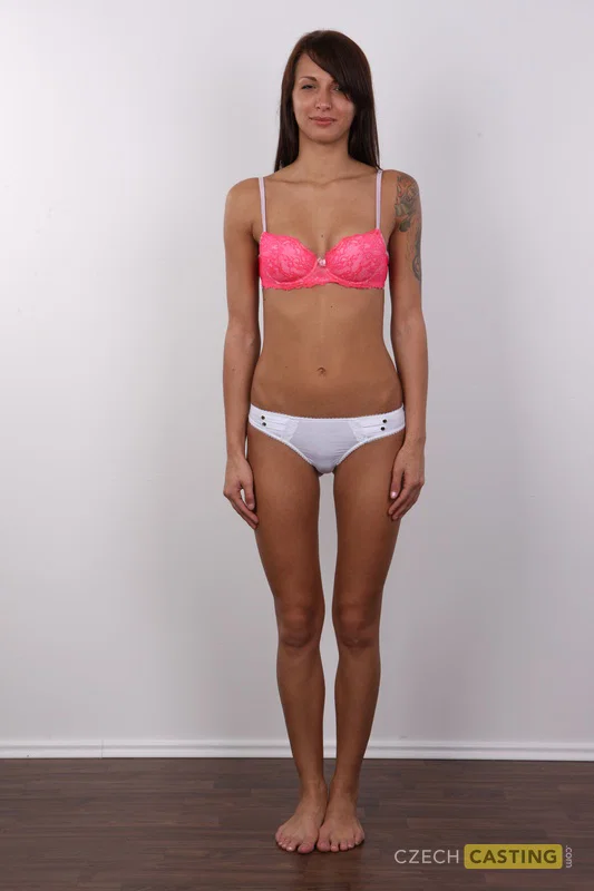 Brunette amateur with a hairless pussy stands naked after removing her clothing  - Clothed, Amateur, Ass, Nipples, Panties, PAWG, Tattoo, Casting, Jeans, Lingerie  - Photo 7