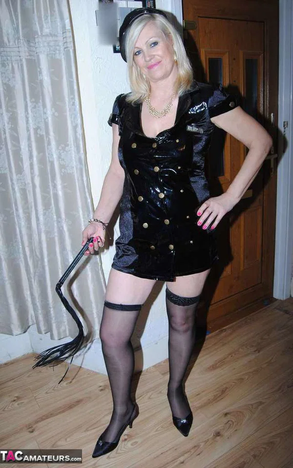Mature blonde woman Dimonty frees her tits and twat from a short latex dress  - Mature, Saggy Tits, Latex, Stockings, Blonde, Amateur, Clothed, European, Lingerie, Panties  - Photo 13