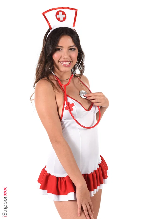 Cute brunette Camila Palmer doffs naughty nurse attire before toying her pussy  - Nurse, Uniform, Babe, Big Tits, Beautiful, Skirt, Legs, Panties, High Heels, Clothed  - Photo 4
