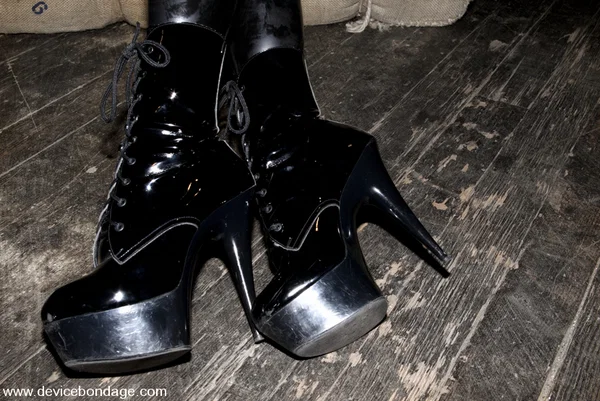 Claire Adams sports red lips during the course of a hardcore bondage scene  - MILF, BDSM, Face, Ass, Redhead, Bondage, Boots, Natural Tits, Feet, Nipples  - Photo 1