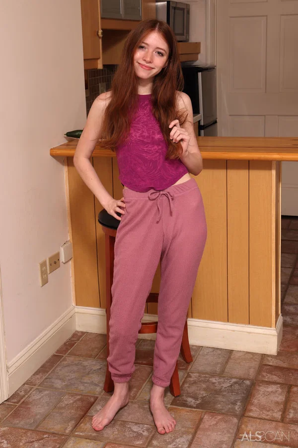 Young redhead Myra Glasford gets naked to masturbate on a kitchen counter  - Redhead, Pussy, Kitchen, Spreading, Tiny Tits, Clothed, Masturbation, Feet, Ass, Dildo  - Photo 2