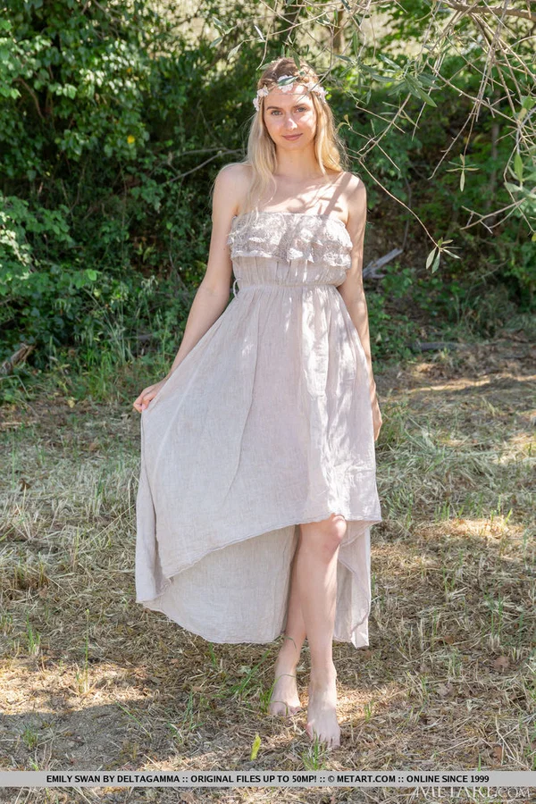 Sweet blonde teen Emily Swan gets naked in a treed area that provides shade  - Close Up, Model, Ass, Upskirt, Skirt, Natural Tits, Undressing, Outdoor, Legs, Teen  - Photo 1