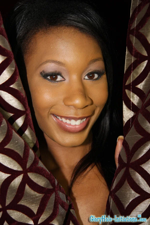 Ebony Rane Revere satisfies white dick through the hole in the red wall  - Gloryhole, Ebony, African, Pussy, High Heels, Black, Bikini, Big Tits, Handjob, Blowjob  - Photo 1
