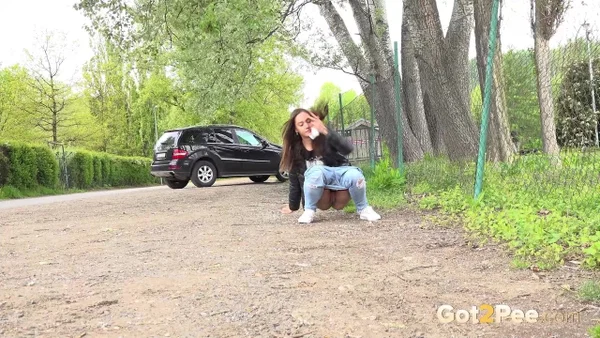 Solo girl Naomi Bennet takes a pee on a gravel roadway when caught short  - Pissing, Caught, Public, Jeans, Pussy, Spreading, Close Up, Outdoor, Czech, Beautiful  - Photo 3