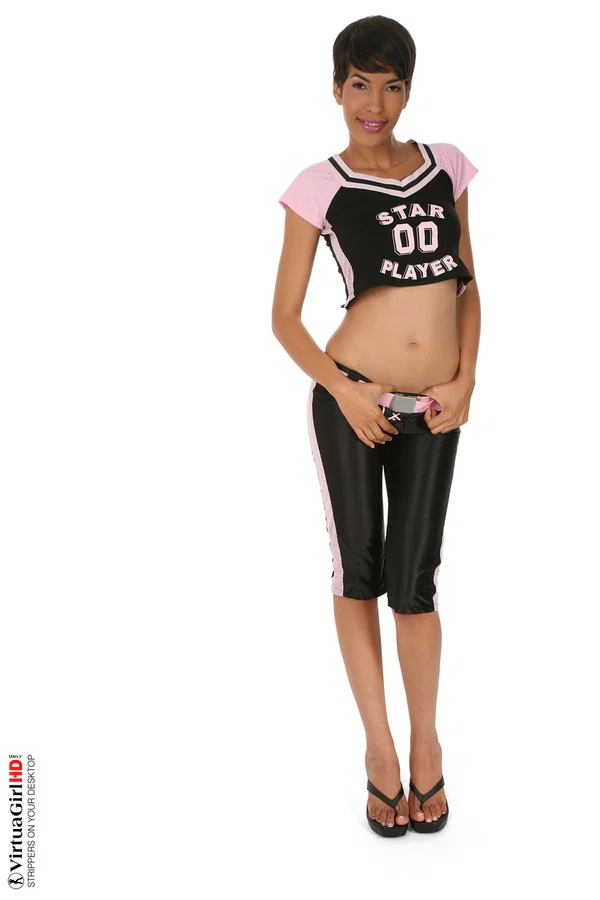 Short haired female Jasmine Arabia holds a basketball while getting naked  - Arab, Short Hair, Latina, Sports, Natural Tits, Tiny Tits, Babe, High Heels, Undressing, Clothed  - Photo 3