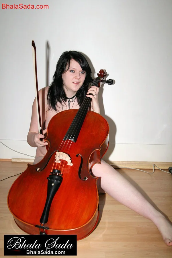 Raven-haired MILF Bhala Sada sitting in a chair playing the cello in the nude  - MILF, Non Nude, Beautiful, Brunette, Babe, Solo  - Photo 14