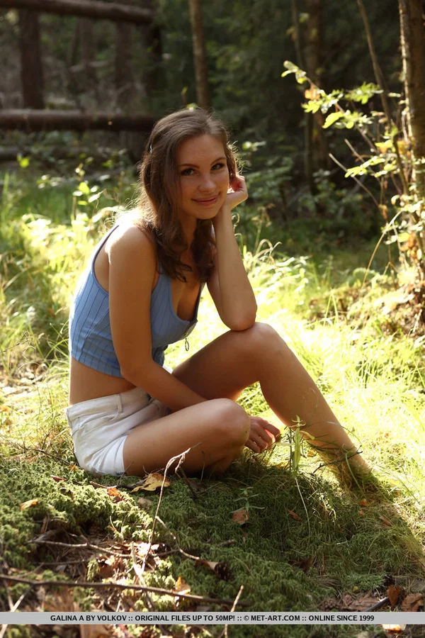 Nice teen Galina A bares her tight ass as she gets naked on forest floor  - Outdoor, Shorts, Glamour, Beautiful, Undressing, Hairy, Clothed, Legs, Ass, Spreading  - Photo 1