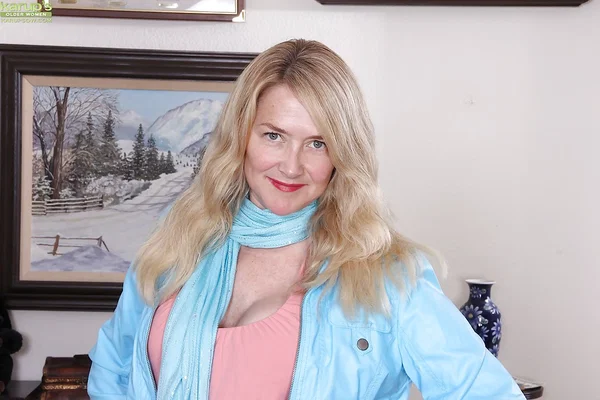 Older blond lady Eva Griffin folds back labia lips after stripping off clothes  - Mature, Big Tits, Legs, Panties, Close Up, Spreading, Pussy, Blonde, High Heels, Clothed  - Photo 1