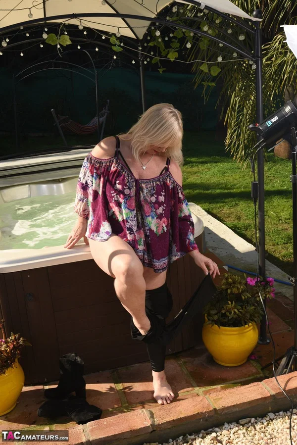 Fat older blonde Melody peels off black leggings afore an outdoor hot tub  - Mature, BBW, Curvy, Thick, Yoga Pants, Pool, Chubby, Amateur, Outdoor, Non Nude  - Photo 11