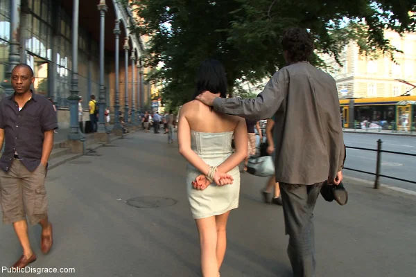 Amateur chick Lucy Bell is left handcuffed and naked on a public sidewalk  - Public, BDSM, Bondage, Outdoor, Ass, Skirt, Natural Tits, Non Nude, Upskirt, Clothed  - Photo 7