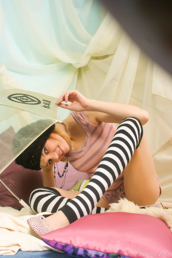 Amateur model uncups her tiny tits before removing striped OTK socks  - Amateur, Clothed, Babe, Skirt, Model, Feet, Glamour, Solo, Tiny Tits, Ass  - Photo 7