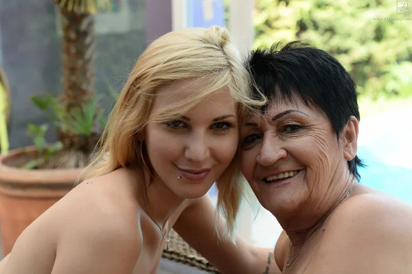 Blonde teen Candy Sweet engages in lesbian intercourse with granny Anastasia  - Old Young, Lesbian, Mature, Teen, Pussy, Outdoor, Short Hair, Bikini, Cute, Spreading  - Photo 20