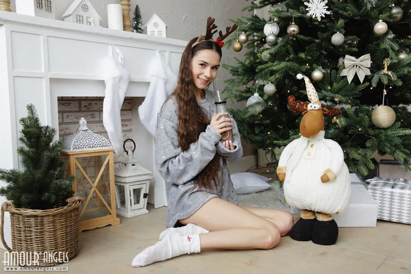Young girl with a fresh face Leona Mia gets naked in front of a Christmas tree  - Christmas, Socks, Teen, Skinny, Cute, Natural Tits, Spreading, Nipples, Pussy, Amateur  - Photo 1