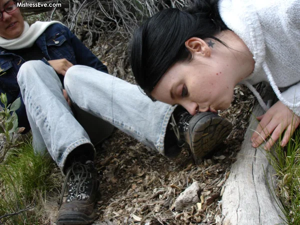 Lesbian girl has her submissive lover lick her boots and feet in the outdoors  - Boots, MILF, Feet, Jeans, Glasses, Outdoor, Lesbian, Close Up, Non Nude  - Photo 2