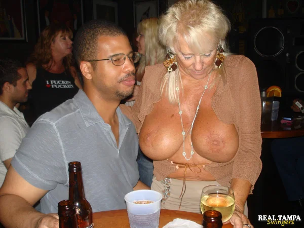 Amateur swingers show off her big breasts at a wild party at the bar  - Granny, Swingers, Mature, Amateur  - Photo 15