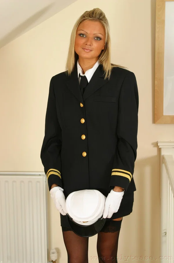 Sexy blonde Jennifer takes off her sexy uniform and poses in black stockings  - Uniform, Skirt, Stockings, Petite, Beautiful, Legs, Teen, Undressing, Non Nude, High Heels  - Photo 2