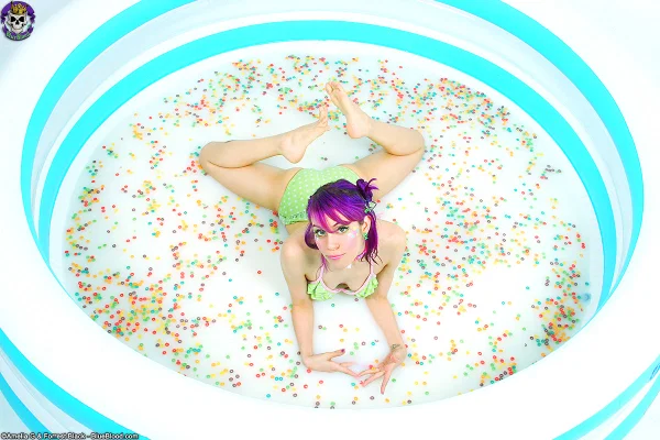 Solo girl Dorothy Perkins doffs a bikini to pose nude in a pool of Fruit Loops  - Fetish, Pool, Ass, Feet, Legs, Bikini, Babe, Beautiful, Tiny Tits, Asshole  - Photo 8