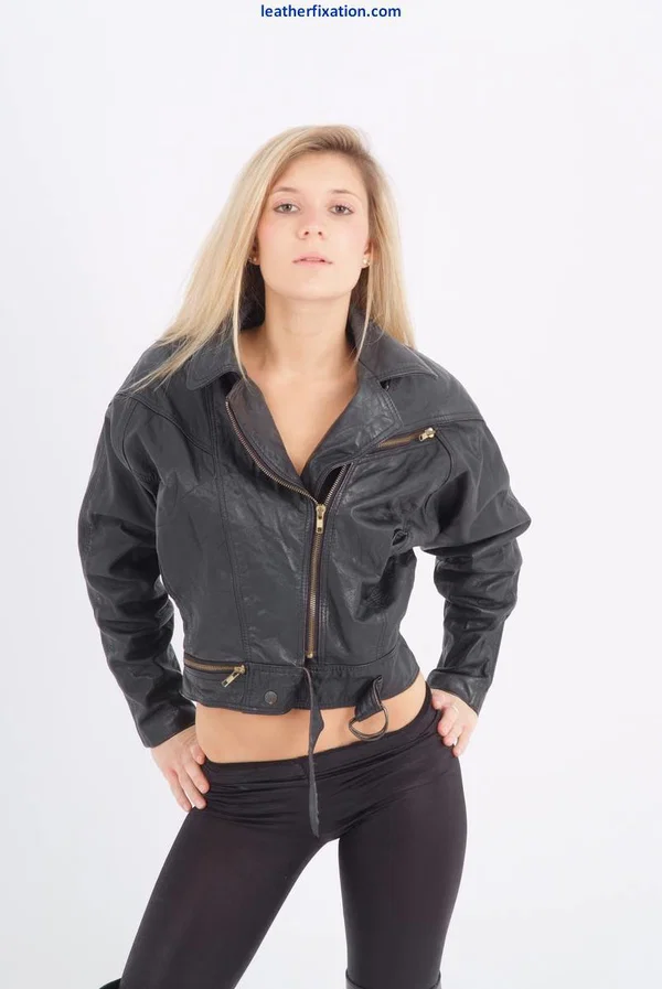 Blond chick unzips her leather jacket in a black bra and leggings  - Yoga Pants, Clothed, Boots, Babe, Face, Blonde, Lingerie, Solo, Leather, Ass  - Photo 3