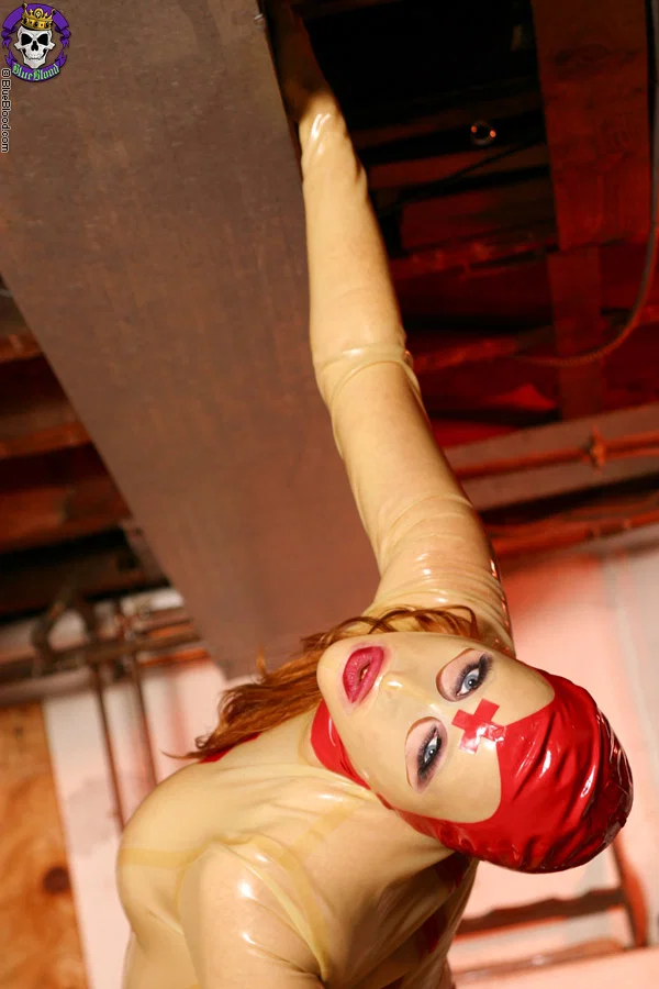 Solo model Julie Simone spreads her pussy lips in head to toe latex apparel  - Latex, Nurse, Mature, MILF, Boots, Fetish, Redhead, Uniform, Ass, High Heels  - Photo 15