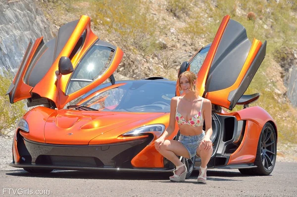 Slim solo girl stretches out her pink pussy after modeling by a sports car  - Babe, Outdoor, Big Tits, Fingering, Blonde, Pussy, Shorts, Dildo, Spreading, Bikini  - Photo 1