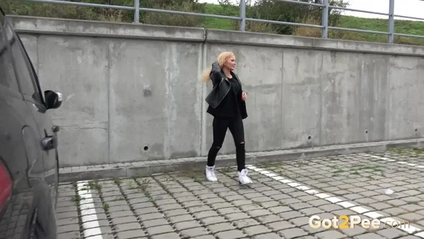 Blonde girl Jena Lovely pulls down black leggings for a pee near an overpass  - Pissing, Babe, Outdoor, Blonde, Leather, Clothed, Undressing, Beautiful, Solo  - Photo 15
