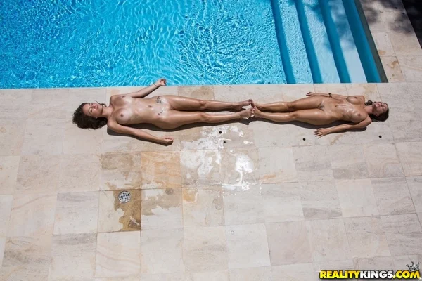 Stunning brunette lesbians have some pussy licking fun at the poolside  - Pool, Outdoor, Lesbian, Glasses, Pussy Licking, Big Tits, Face, Bikini, Short Hair, Spreading  - Photo 11