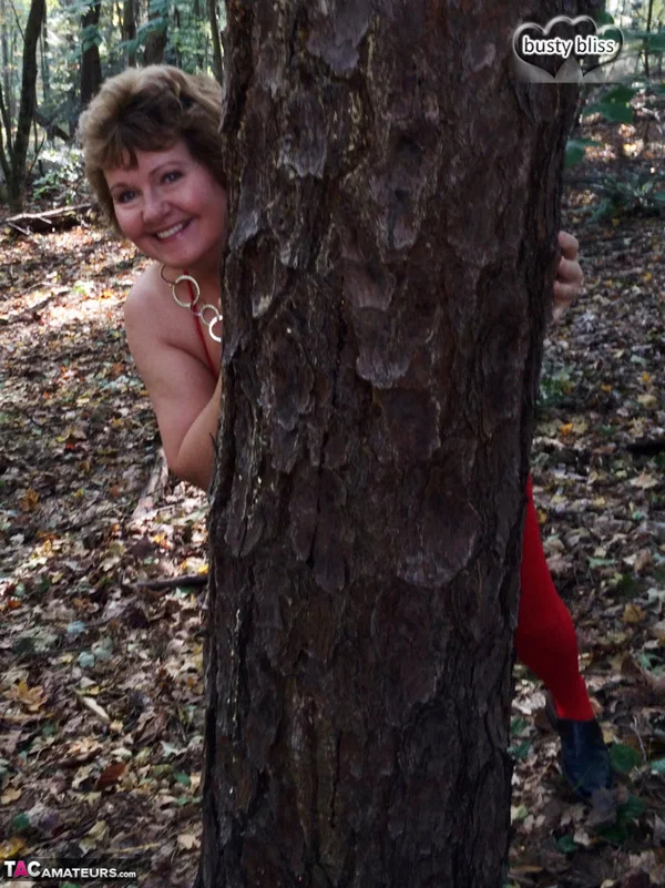 Older amateur Busty Bliss displays her big natural tits while nude in a forest  - Mature, Cougar, Saggy Tits, Thick, Close Up, Nipples, Curvy, Outdoor, Natural Tits, Chubby  - Photo 3