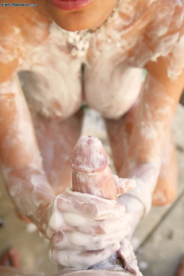Busty pornstar Kelly Madison rubs lotion on her body and strokes a big dick  - Wet, Big Tits, MILF, Saggy Tits, Mature, POV, Natural Tits, Outdoor, Glasses, Stockings  - Photo 16