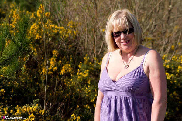 Blonde granny gets naked in sunglasses and stockings in a backyard  - Granny, Saggy Tits, Short Hair, Glasses, Chubby, Curvy, BBW, Stockings, Bikini, Thick  - Photo 3