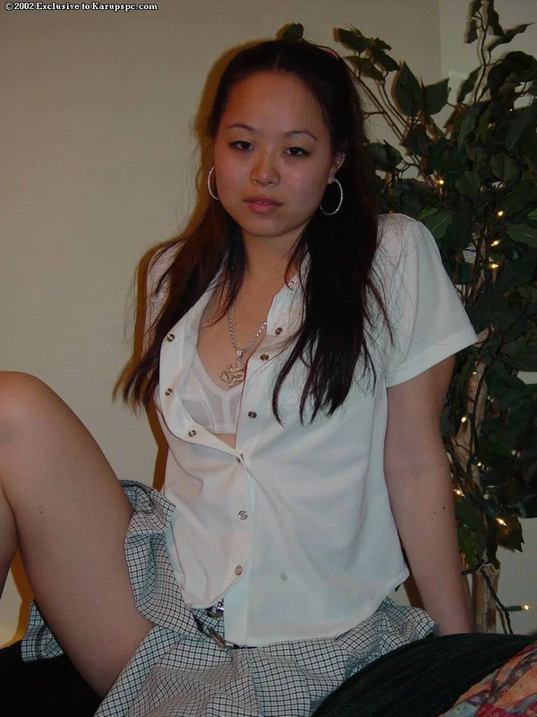 Arousing model China is posing instead of making her homework  - Asian, Amateur, Teen, Brunette, Babe, Panties, Spreading, Skirt, Ass, Pussy  - Photo 9